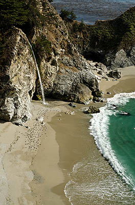 CA: South Coast Region, Monterey County, Los Padres National Forest, Big Sur, McWay Cove, Julia Pfeiffer Burns State Park, Waterfall flows over cliffs onto beach [Ask for #271.063.]