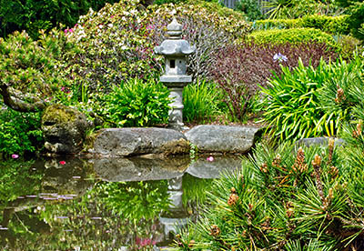 OR: Coos County, Coos Bay Area, Cape Arago Parks, Shore Acres Garden, Garden view; pond with sculpture [Ask for #274.023.]