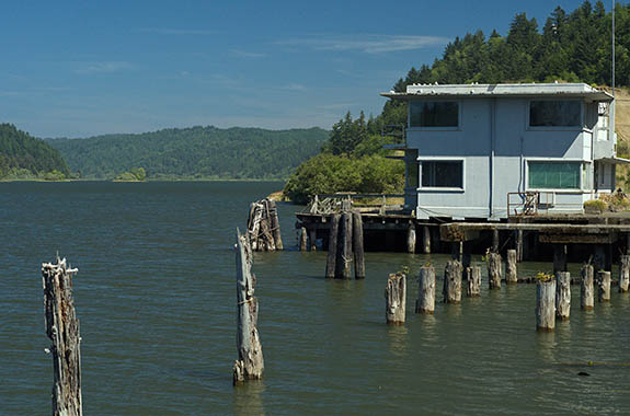OR: South Coast Region, Douglas County, Pacific Coast, Reedsport Area, Town of Reedsport, Boardwalk, Derelict Building in an abandoned area of the wharf [Ask for #274.527.]