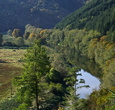 OR: Douglas County, Coast Range, Smith River Area, Lower Smith River, View over the Smith River as it runs beneath steep mountain slopes. [Ask for #276.029.]