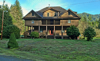 OR: South Coast Region, Coos County, Coast Range, Old Coos Bay Wagon Road, Dora Community, The Edwin and Ethel Abernethy House, built in the early 20th century as a travelers lodge and guest house, faces the Old Wagon Road. [Ask for #276.259.]