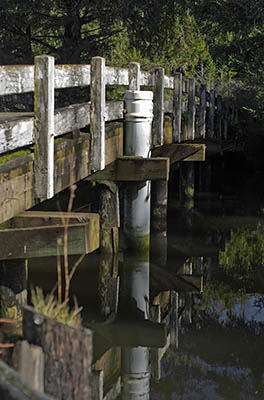 OR: South Coast Region, Coos County, Coos Bay Area, Cape Arago Parks, South Slough National Estuarine Reserve, Wood bridge over Winchester Creek, at the kayak launch ramp [Ask for #276.411.]