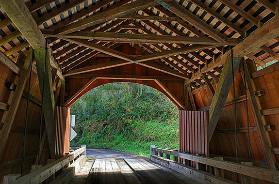 OR: Lincoln County, Pacific Coast, Yachats Area, Yachats River Covered Bridge. Interior of covered bridge, showing its truss structure [Ask for #276.535.]
