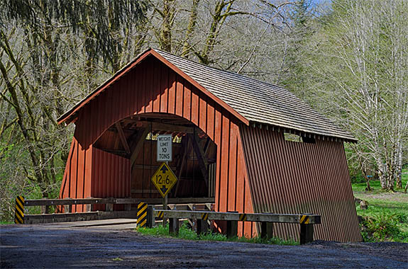 OR: Lane County, Pacific Coast, Yachats, Yachats River Covered Bridge, View of red covered bridge [Ask for #276.537.]