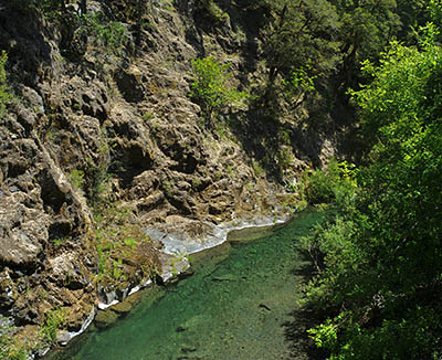 OR: Curry County, Coast Range, Elk River, Butler Bar Campground. The river runs through a cliff-sided gorge [Ask for #277.030.]