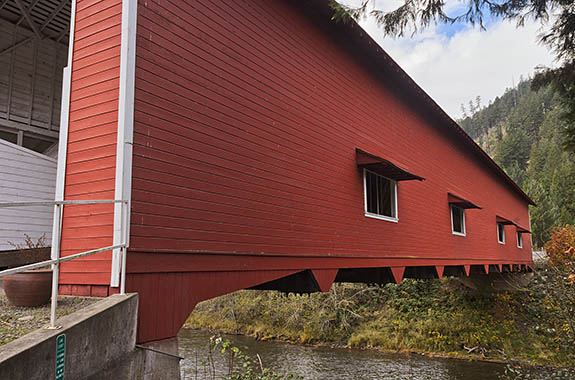 OR: Lane County, South Willamette Valley, Eugene Area, Office Covered Bridge. Red covered bridge, carrying traffic to a local park. At 180 feet, this is Oregon's longest covered bridge. [Ask for #277.401.]