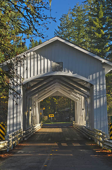 OR: Linn County, Cascades West Slope, South Santiam River Area, Short Covered Bridge. Covered bridge carrying traffic for a well-traveled county road. [Ask for #277.444.]