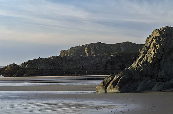 OR: Coos County, Bandon Area, South Beaches, Devils Kitchen State Wayside. Late afternoon beach view towards Haystack Rock on receding tide [Ask for #278.029.]