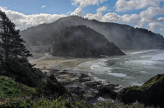 OR: South Coast Region, Lane County, Pacific Coast, Florence Area, Florence's North Coast, Heceta Head, View of coast, with cliffs and beaches, from the lighthouse, with Conde McCollough bridge. [Ask for #278.084.]