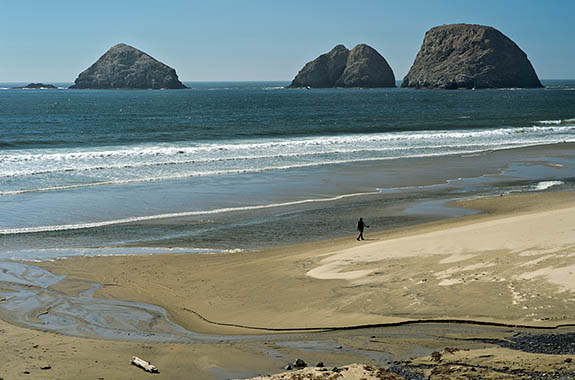 OR: North Coast Region, Tillamook County, Pacific Coast, Netarts Bay Area, Oceanside, The sea stacks known as Three Arch Rocks, as viewed over Oceanside's beach [Ask for #278.503.]